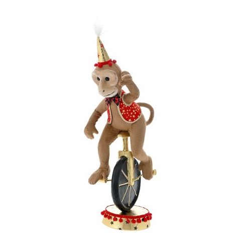 Кафява маймунка върху колело